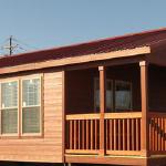 Mahogany  Cemplank Lap Siding
with Red Metal Roof