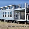 The Whitman 106 Elite model By Platinum Cottages. Shown here with an optional double decker porch and double loft. This model is exclusive to Recreational Resort Cottages.