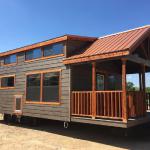 The Tumbleweed model P-576 by Platinum Cottages on display @ RRC Athens. This 15' wide park model features a king sized downstairs bedroom. Available with an optional front porch, loft, moveable island and more.