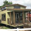 The Tumbleweed model P-576 by Platinum Cottages on display @ RRC Athens. This 15' wide park model features a shed style front porch roof, a huge loft and a king sized downstairs bedroom.